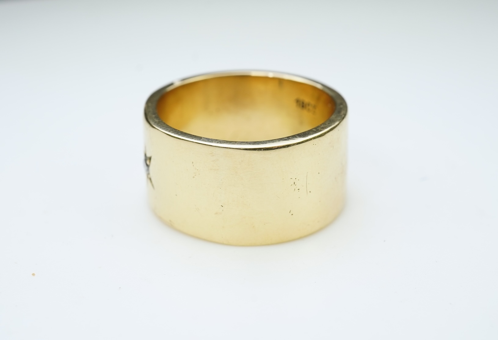 A gold and diamond ring